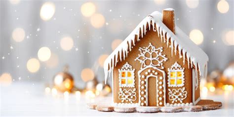 Premium AI Image | A festive christmas gingerbread house decorated with white icing