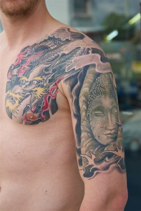 Dragon and buddha tattoo on arm by graynd - Tattooimages.biz