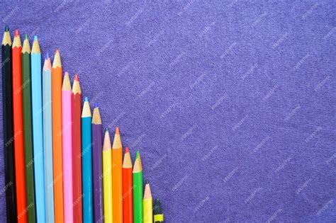 Premium Photo | A descending chart of colorful bright variegated drawing pencils and space for text