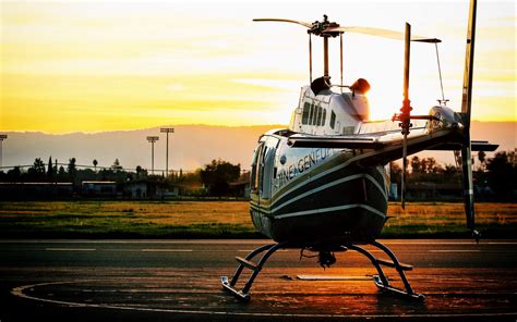 Download wallpaper 1920x1200 helicopter, sunset, airfield widescreen 16:10 hd background