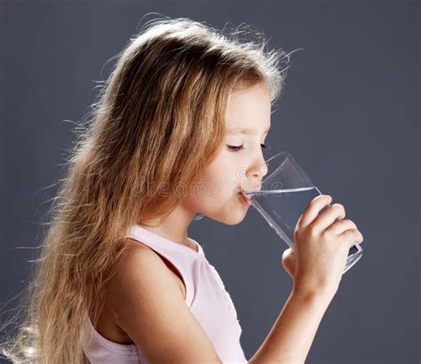 Girl Drinking Water from Glass Stock Photo - Image of drinking, thirsty ...