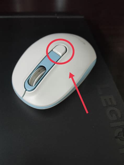 My mouse has this weird button behind the scroll wheel. What is it's ...