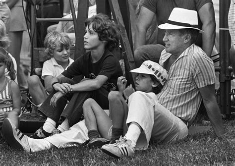 Kick-ass shot of Canadian Prime Minister Pierre Trudeau taking his sons Sacha, Justin and Michel ...