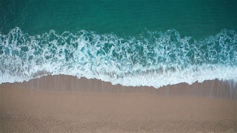 Aerial View: Beautiful Coastal Waves Meeting Stock Footage SBV ...