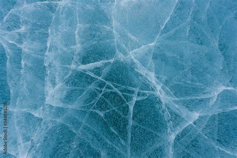 Beautiful ice of Lake Baikal with abstract cracks Stock Photo | Adobe Stock