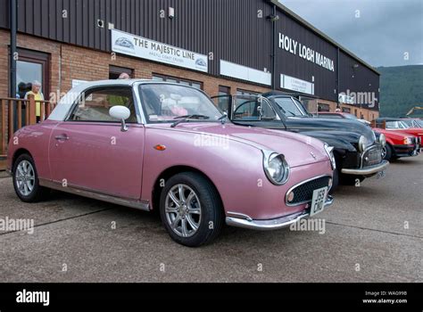 1991 Pink Retro-style Nissan Figaro 2 Door Fixed Profile Convertible White Roof front drivers ...