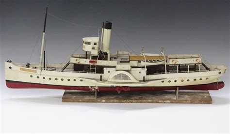 A wooden model of the paddle steamer PS Bilsdale, length 90cm, together with another model of a padd