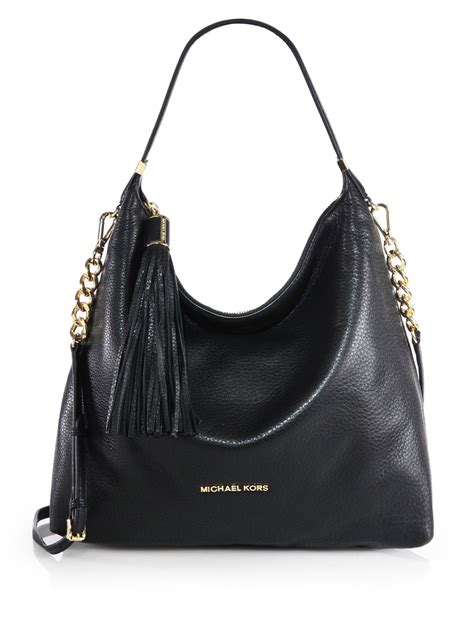 MICHAEL Michael Kors Large Tassel Shoulder Bag in Black | Lyst