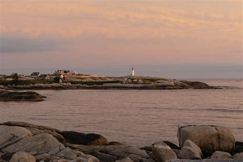 Peggy's Cove lighthouse at sunset Photograph by Josef Pittner - Fine Art America