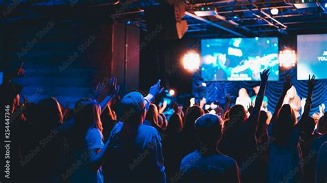 crowd of people at worship concert Stock Photo | Adobe Stock