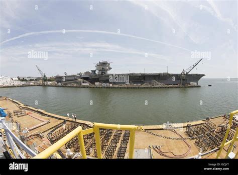 NEWPORT NEWS, Va. (July 15, 2018) -- USS Enterprise (CVN 65) sits ...