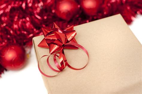 Photo of Brown paper wrapped Christmas gift | Free christmas images
