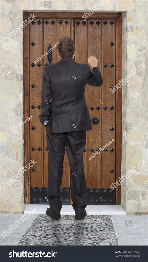 Businessman Knocking Wooden Door Stock Photo 116736502 | Shutterstock