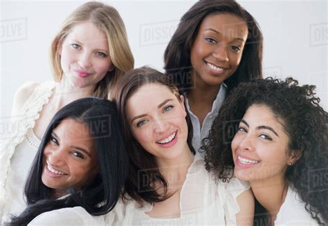 Women smiling together - Stock Photo - Dissolve