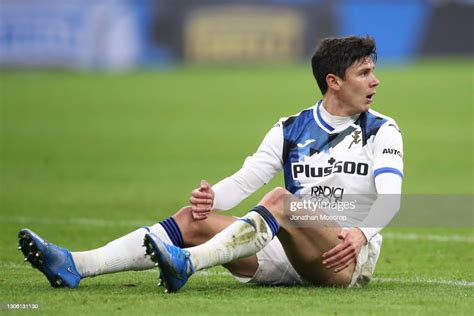 Matteo Pessina of Atalanta reacts as he sits on the pitch during the ...