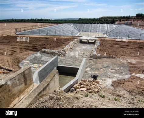 farm reservoir construction Stock Photo - Alamy