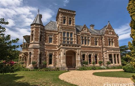 This historic Gothic Revival style brick & stone mansion is located at 12 Stoke Sreet in New ...