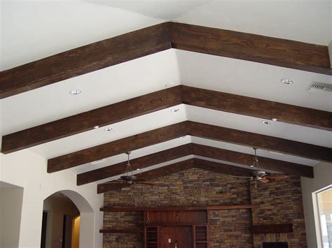 ELEVATE YOUR CEILINGS WITH FAUX WOOD BEAMS - Realm of Design Inc.