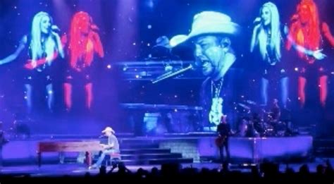 Carrie Underwood Virtually Appears At Jason Aldean Concert To Sing Their Hit Duet