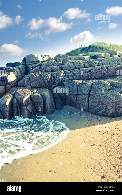 old natural rock formation on a coastal beach in county Donegal ...