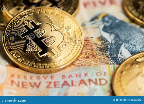 Bitcoin BTC Cryptocurrency Coins on New Zealand Dollar Banknotes. Stock ...