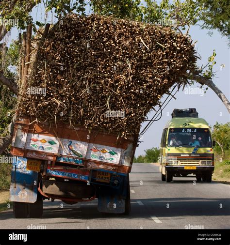 Overloaded Truck On The Road To Mysore, India Stock Photo - Alamy