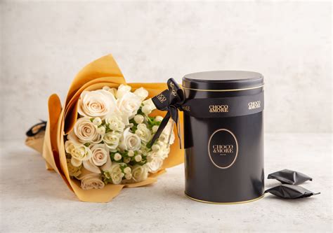 Black tin gift box with flower bouquet | Chocolates&More