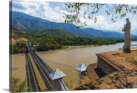 Colombia, Santa Fe de Antioquia, suspension bridge over Cauca river ...