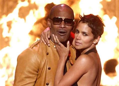 Jamie Foxx and Halle Berry set pulses racing with passionate kiss and mutual groping at awards ...