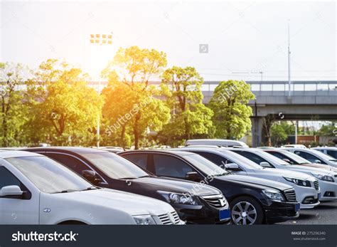 stock-photo-cars-in-parking-lot-275296340