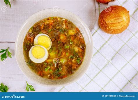 Vegetable Soup with Egg and Crusty Rolls Stock Photo - Image of green ...