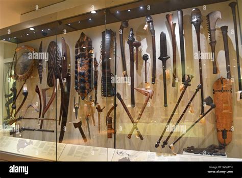 Display of old and tribal weapons at Manchester Museum, UK. Part of the ...