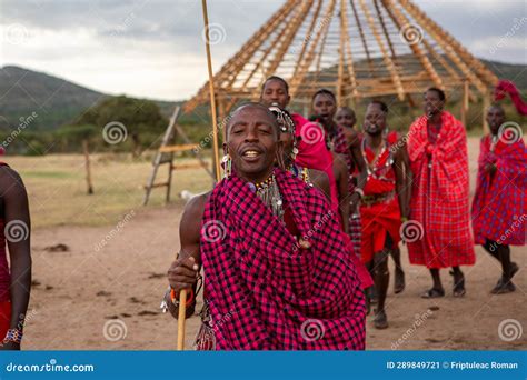 Masai in Traditional Colorful Clothing Showing Maasai Jumping Dance at ...