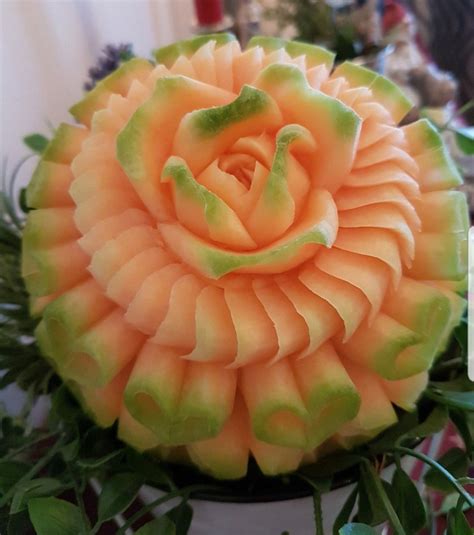 Cantaloupe carving by me.