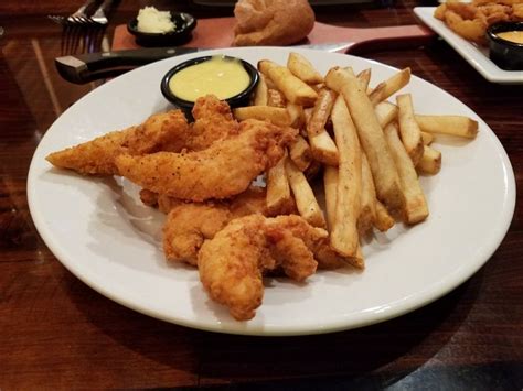 Chicken Tenders and fries with honey mustard dipping sauce at Longhorn Steakhouse. | Honey ...