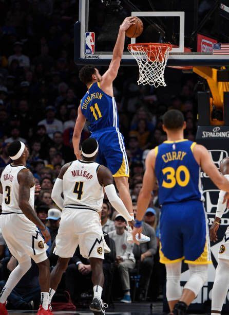 Golden State Warriors guard Klay Thompson slam dunks over Denver ...