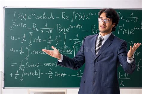 The Young Male Math Teacher in Classroom Stock Image - Image of math, green: 140025453