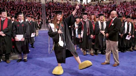 Gamecocks Mascot Wears Costume Feet to Graduation Ceremony