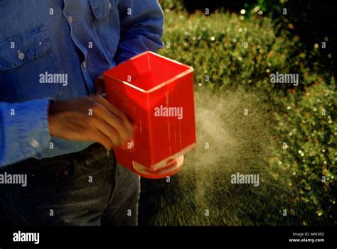 Spreading fertilizer hi-res stock photography and images - Alamy