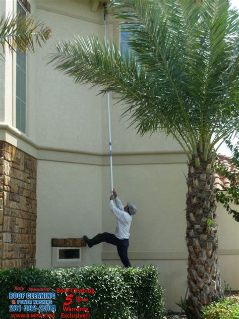 scrubbing to help remove dirt dobber nests from stucco house - Picture ...