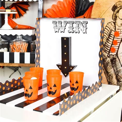 Step right up and test your luck! Entertain guests at your Halloween ...