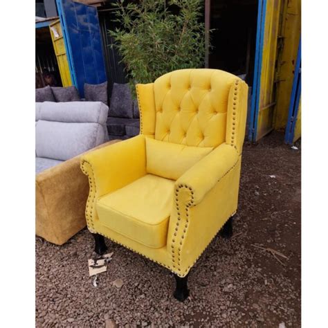 Classic yellow wing chair – Liberty Furniture