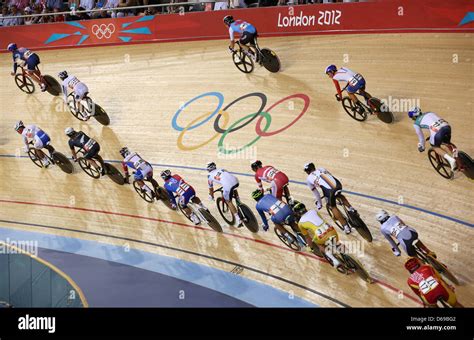 Riders compete in the Men's Omnium Elimination Race as part of the cycling event at the ...