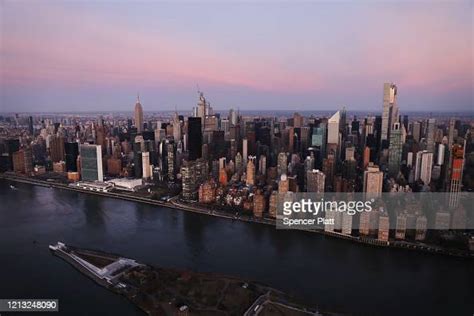 Dawn breaks over Manhattan as the city struggles to contain the... News ...