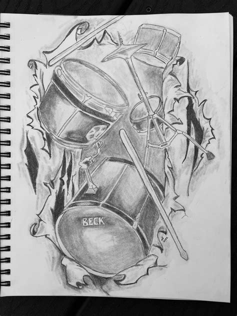 a drawing of a drum set on paper