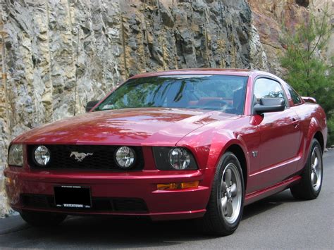 File:2005 Ford Mustang GT Coupe in Redfire with Bullitt wheels KFoley.jpg - Wikipedia