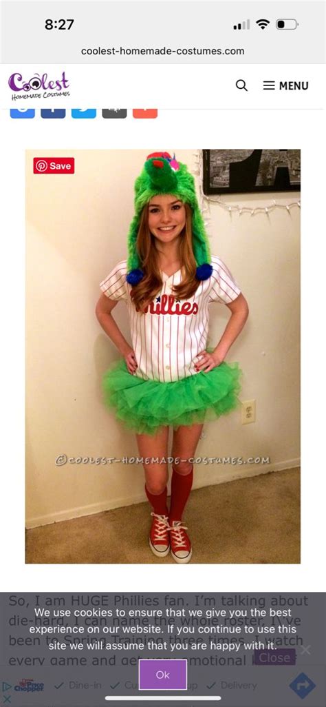 a girl in a costume that is wearing a green hat and dress with red socks