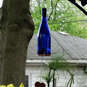 Christy L. added a photo of their purchase Wine Bottle Lanterns, Glass Bottle Crafts, Lighted ...