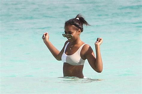 Sasha Obama Wear White Bikini On Beach Vacation – See Photos