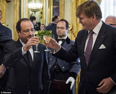 Francois Hollande raises a toast with Netherlands' king as Valerie Trierweiler is 'doing better ...